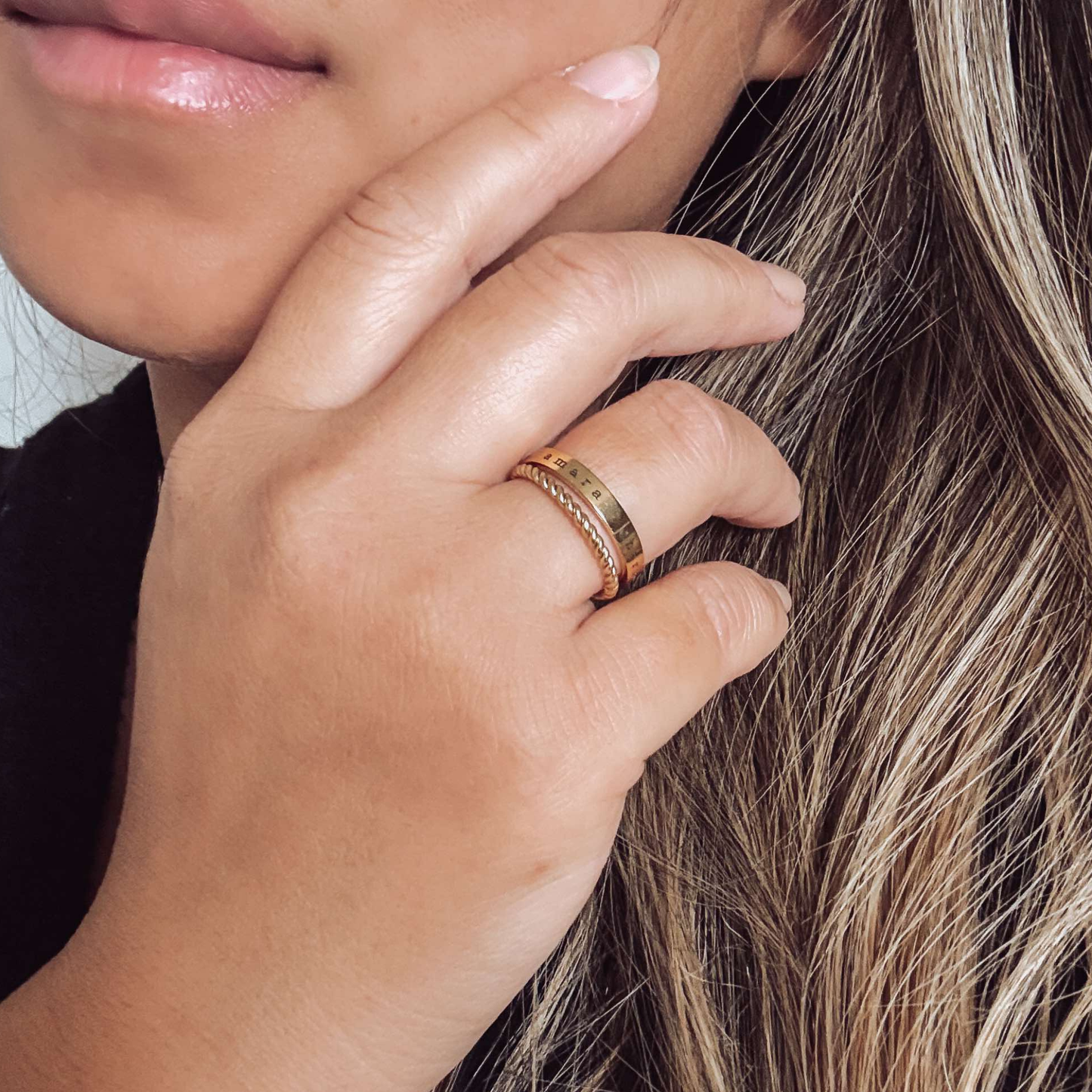 Engraved ring with braided stacker ring